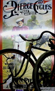 Pierce Cycles poster showing a woman riding a safety bicycle, Works Buffalo N.Y.