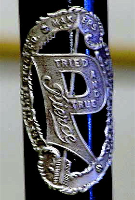 Pierce head badge with Tried and True banner threaded by an arrow