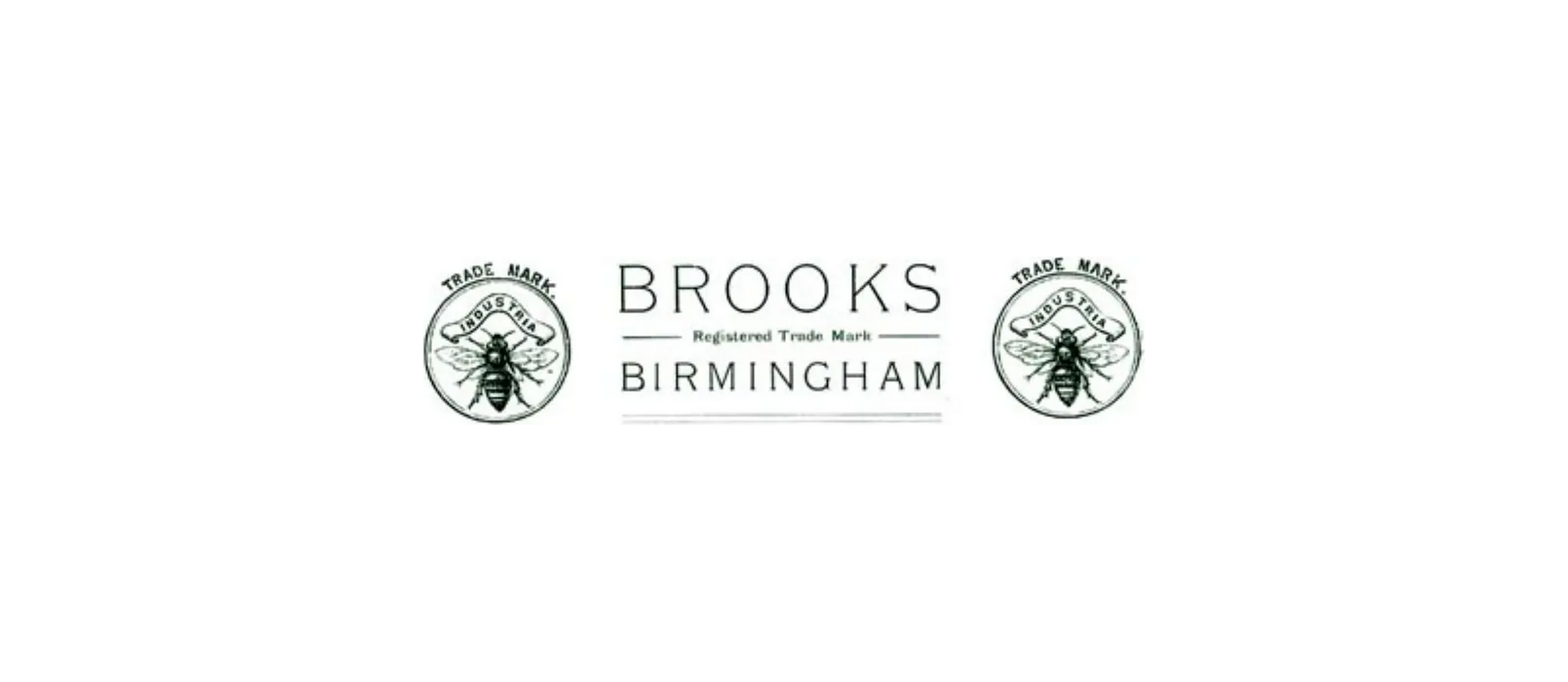 The Brooks trade mark as printed at the head of the 1904 catalog pages: the word BROOKS above the lines Registered Trade Mark and BIRMINGHAM, flanked on either side by a circular roundel enclosing a bee above a scroll lettered INDUSTRIA.