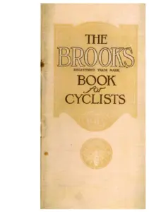Cream cloth-grain card catalog cover printed in gold-brown. A shaped centre panel reads THE BROOKS, REGISTERED TRADE MARK, BOOK for CYCLISTS in outline capitals, with 1913 in a scrolled cartouche beneath and a roundel below that showing a bee with wings spread above a banner lettered INDUSTRIA. The cover is lightly soiled at the fore-edge with a small stain at the spine.