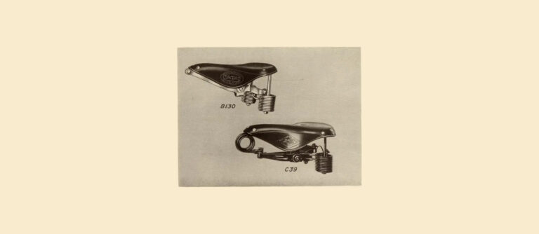 Halftone catalog plate showing two sprung leather bicycle saddles in three-quarter view, the Brooks B.130 above and the Brooks Challenge C.39 below, each with a badge on the leather top and closely wound tension coil springs at the rear.