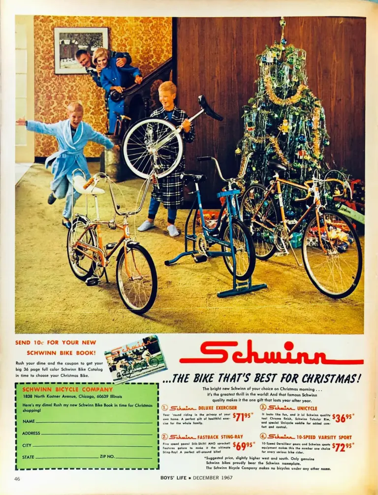 Advertisement photographed in a living room on Christmas morning, with two boys in pajamas running toward a Fastback Sting-Ray, an exerciser, a unicycle and a Varsity Sport beside a decorated tree