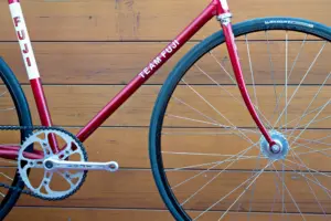 Drive side of the Team Fuji from the crankset forward, showing the Sugino chainring, the fork and the large-flange front hub