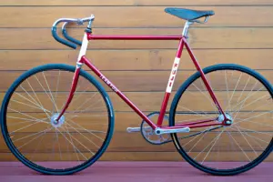 Non-drive-side profile of the 1970s Team Fuji track bicycle, showing the FUJI seat tube panel and the Nitto track handlebar