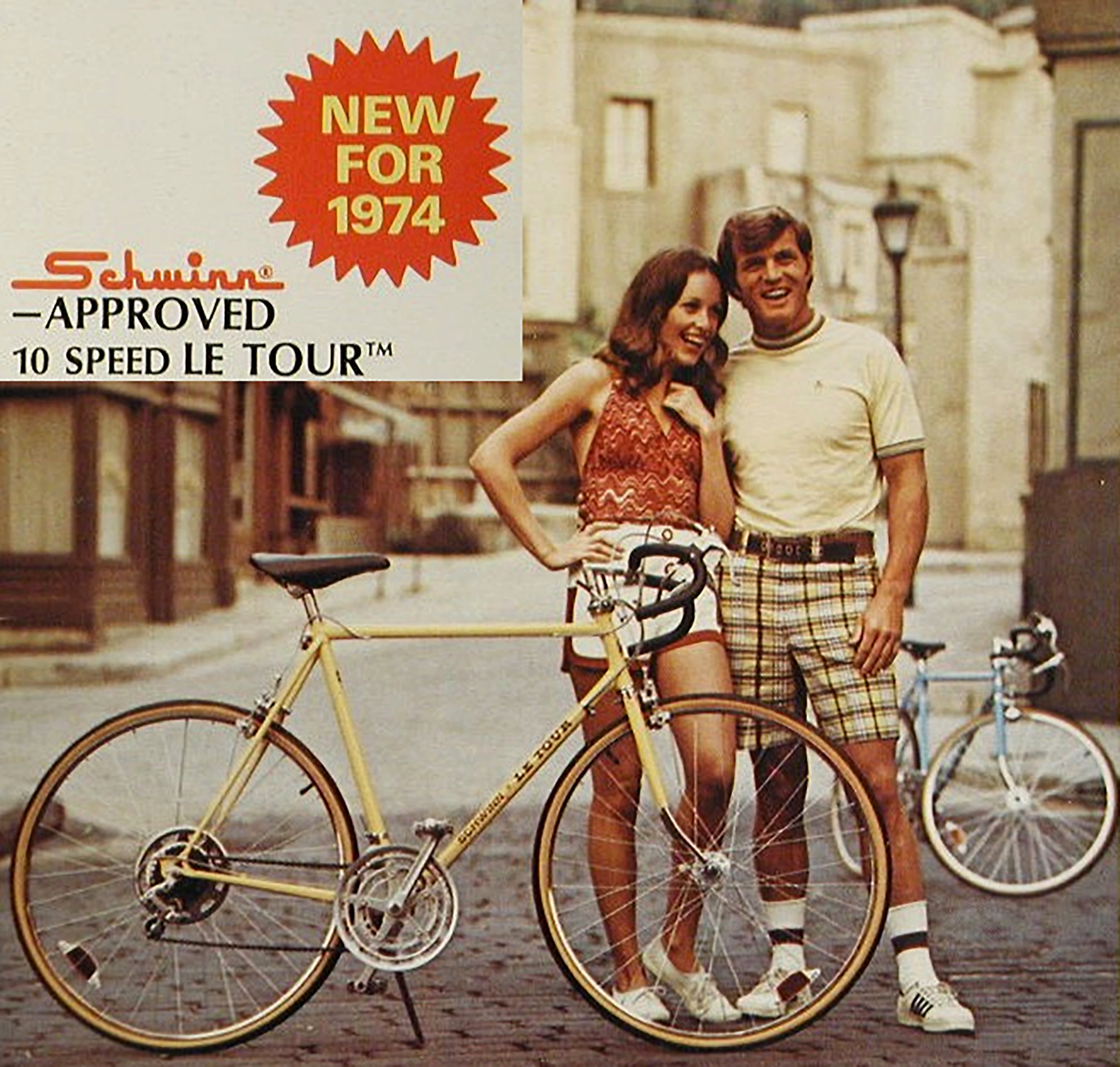 Catalog page headed New for 1974, Schwinn-Approved 10 Speed Le Tour, showing a couple with a Le Tour bicycle on a cobbled street beside a starburst reading New for 1974
