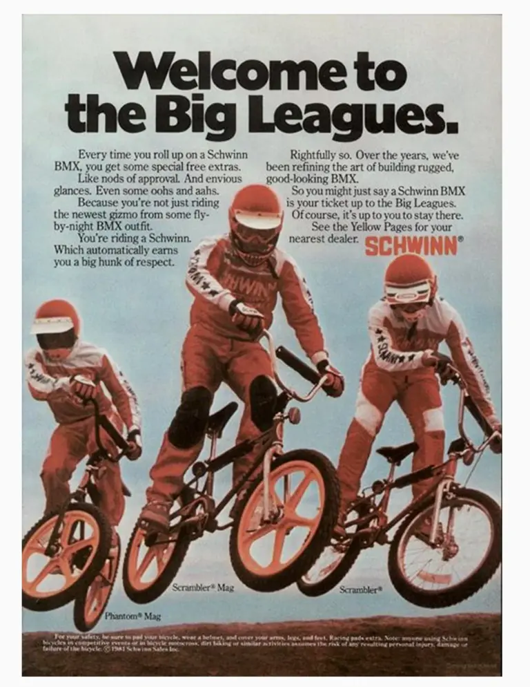 Advertisement headed Welcome to the Big Leagues, showing three riders in red and white racing kit jumping Schwinn BMX bicycles with mag wheels against a pale sky