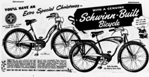 Full-width newspaper advertisement headed You'll Have an Extra Special Christmas with a Genuine Schwinn-Built Bicycle, the words Schwinn-Built reversed out of a black swing-ticket shape between two drawn balloon-tired bicycles, a step-through model with a rear carrier at the left and a diamond frame with a tank and faired headlamp at the right, the circular Schwinn seal at the far left and a small Santa Claus at the right saying show Dad the bike you want for Christmas.