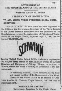 Single newspaper column headed Government of the Virgin Islands of the United States, Charlotte Amalie, St. Thomas, Certificate of Registration, with the serial number 733 at the upper right. In the middle of the column the Schwinn wordmark is reproduced as a block: the word SCHWINN in heavy brush script arched so that the S and final N sit lowest and the double W rides at the top, the stroke of the S sweeping back beneath the word. Below it the text cites United States Patent Office trademark registration No. 423,626 dated March 25, 1947, owned by Arnold Schwinn and Company of Chicago, and the notice is signed Morris F. de Castro, Government Secretary for the Virgin Islands.