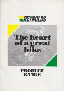 Brochure cover reading The heart of a great bike over PRODUCT RANGE, with a monochrome photograph of a racing cyclist above a colour photograph of a complete lightweight machine, and yellow and green corner flashes.