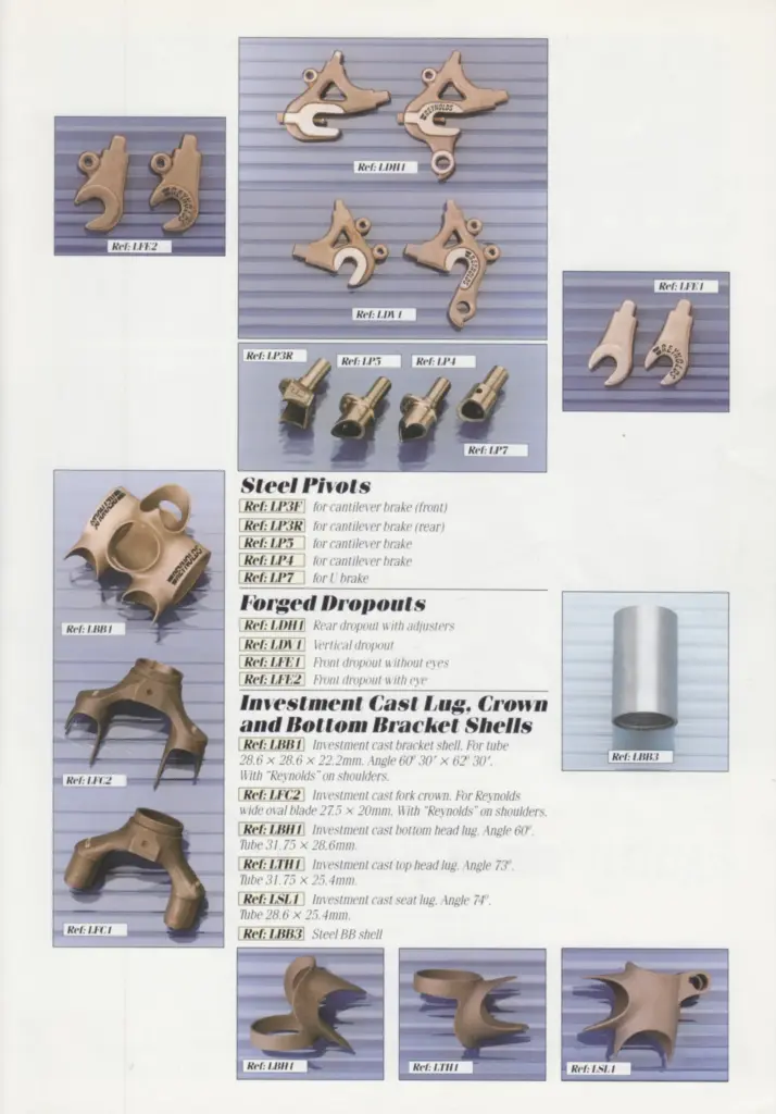 Brochure page photographing Reynolds forged dropouts, front and rear, several stamped REYNOLDS, with steel cantilever pivots, an investment-cast bottom bracket shell carrying the Reynolds name on its shoulders, cast fork crowns, head lugs and seat lugs, with a reference list of part numbers and angles