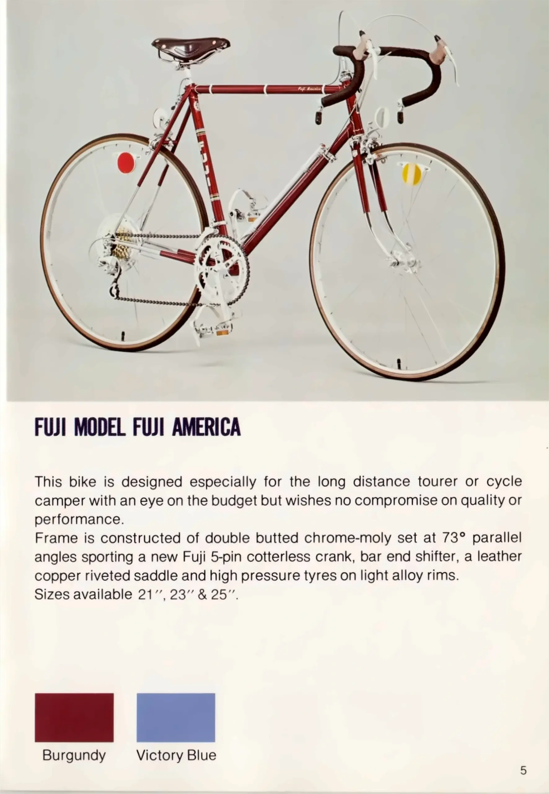 Catalog page for the Fuji America, a burgundy touring bicycle with leather saddle and bar-end shifters, above a description and two color swatches labeled Burgundy and Victory Blue