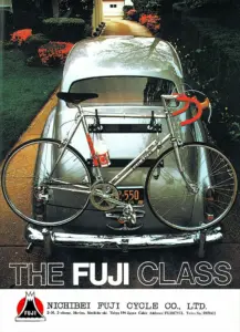 Catalog cover showing a chrome Fuji Racer bicycle mounted on the rear of a Rolls-Royce in a suburban driveway, above the words The Fuji Class