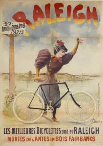 Raleigh poster of 1895 by E. Clouet: a young woman in a purple jacket with puffed sleeves, a rose-trimmed hat and bloomers waves a handkerchief beside a diamond-frame bicycle with yellow wooden rims on a riverbank, under RALEIGH and above LES MEILLEURES BICYCLETTES SONT LES RALEIGH, MUNIES DE JANTES EN BOIS FAIRBANKS.