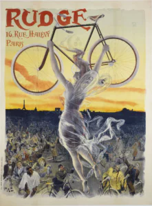 Rudge poster of about 1898 by Pal: a pale goddess in streaming veils rises out of a crowd at dusk and lifts a diamond-frame bicycle over her head, the Paris skyline with the Eiffel Tower black against a yellow and orange sky, under RUDGE 16, RUE HALÉVY, PARIS.