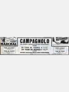 A wide T-shaped newspaper advertisement: CAMPAGNOLO, "Ses célèbres spécialités partout victorieuses!", the 1951 and 1952 Tours de France won by Koblet and Coppi, boxes for four more stage races, the four products and the addresses, with parts of Marchal and Hutchinson advertisements in the upper corners.