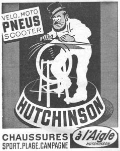 Hutchinson advertisement from L'Officiel du cycle, 8 June 1957, page 32: a bearded cartoon man in a small round cap, drawn like a street knife grinder, presses a long blade against a spinning wheel on a wooden stand, with streaks flying from the wheel, the whole set on a round drum that carries the HUTCHINSON name in heavy capitals.