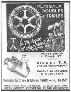 Spécialités TA advertisement from L'Officiel du cycle, 22 June 1957, page 21: a large five-arm chainring and a racing cyclist carrying two bottles on his handlebars are drawn in white on a black panel, with the T.A.
