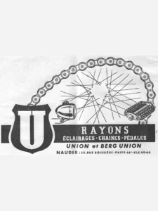 Union advertisement from L'Officiel du cycle, 22 June 1957, page 24: a large black shield bearing a white "U" stands at the lower left, and from its top a bicycle chain arches across the whole width of the advertisement and down to a rubber-block pedal at the right, framing a fan of loose wire spokes and a bullet-shaped bicycle headlamp on its bracket.