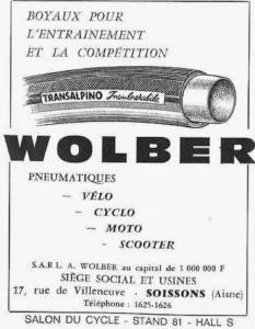 Wolber advertisement from Le Cycle, October 1964: an engraved Transalpino tubular tire above the WOLBER name, tires for bicycles, mopeds, motorcycles and scooters.