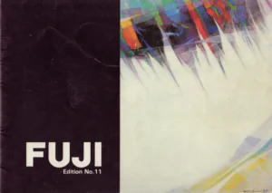The front cover of the Fuji catalog Edition No.11, with the white FUJI wordmark on a dark brown panel at left and an abstract painting at right of white spear shapes rising into bands of red, blue, green and violet.