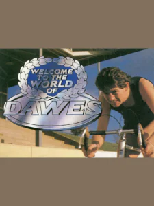 The front cover: "Welcome to the World of Dawes" in a silver laurel wreath over a silver oval nameplate, beside a photograph of a rider in a black sleeveless top bent over the drop handlebars of a bicycle.