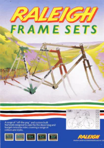 The front cover of Raleigh Frame Sets: three Raleigh framesets, one in white with green and red fades, one in beige and one in brown, set against a painted landscape of hills and a road.