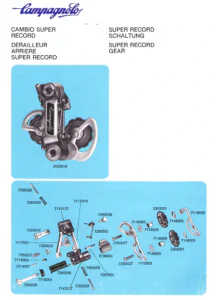 A Campagnolo parts sheet with a photograph of the Super Record rear derailleur (0102018) on a blue panel above an exploded drawing with every part numbered.