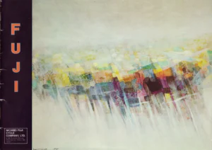The front cover of the Fuji international catalog: an abstract painting of a city skyline in yellow, orange, magenta and blue washes over a pale gray ground, beside a dark purple band carrying the vertical orange word FUJI and the boxed Nichibei Fuji Cycle Company imprint.