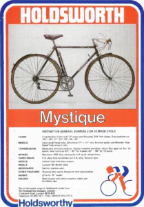 Holdsworth's Mystique general purpose cycle, photographed side on in black with mudguards, a pump and white handlebar tape, over its specification table and the Holdsworthy logo with its stylized cyclist.